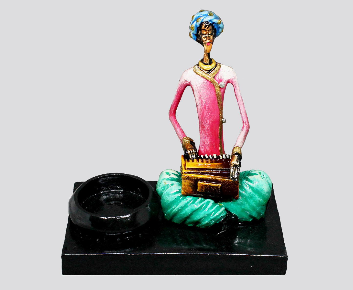 CANDLE HOLDER MALE MUSICIAN PLAYING HARMONIUM - NATURAL COLOUR SINGLE PIECE