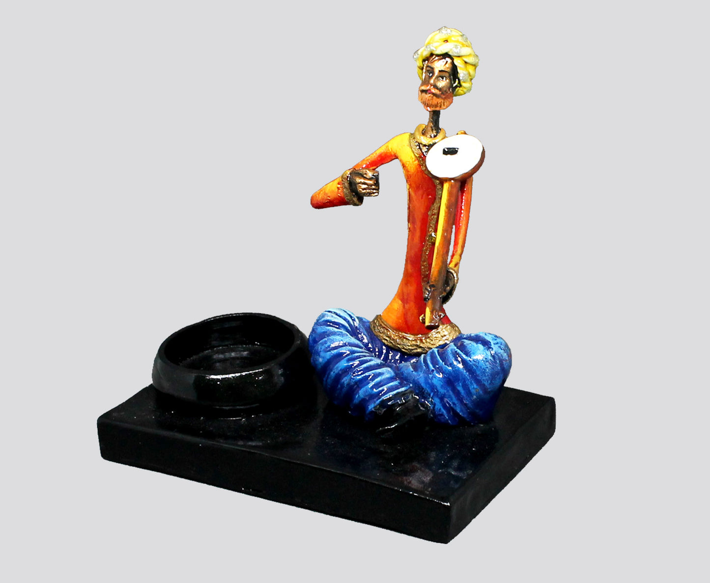 CANDLE HOLDER MALE MUSICIAN PLAYING RAVANTHA - NATURAL COLOUR SINGLE PIECE