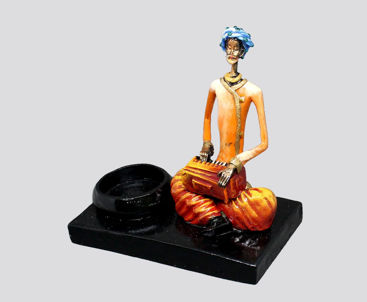 CANDLE HOLDER MALE MUSICIAN PLAYING HARMONIUM - NATURAL COLOUR SINGLE PIECE