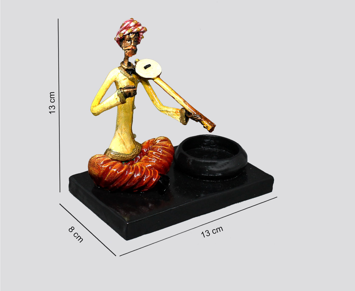 SHOWPIECE OF MALE DOTARA PLAYER MADE OF RESIN