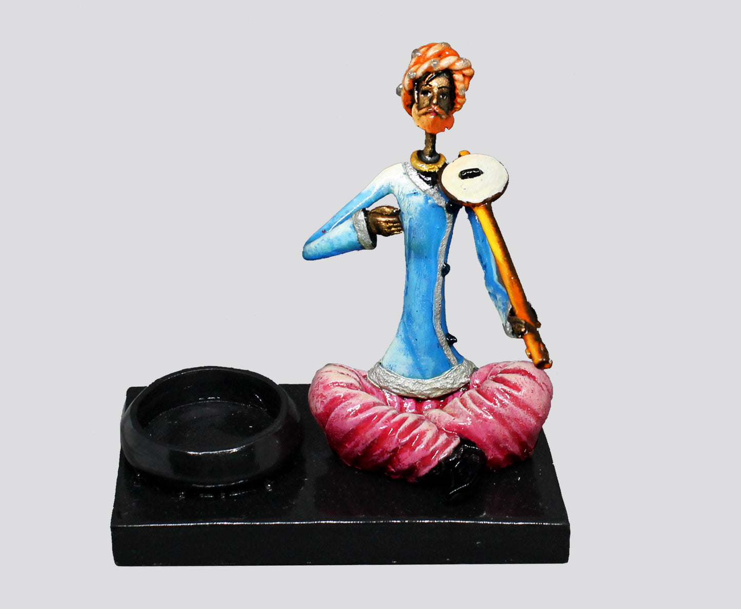 CANDLE HOLDER MALE MUSICIAN PLAYING RAVANTHA - NATURAL COLOUR SINGLE PIECE