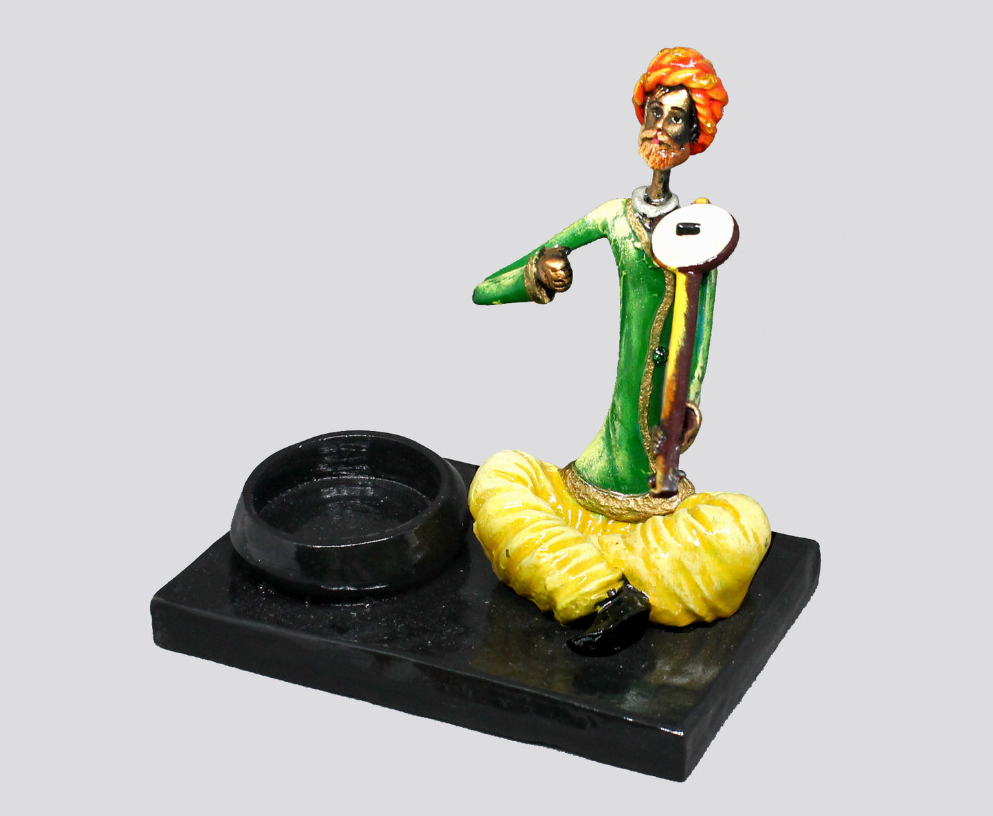 CANDLE HOLDER MALE MUSICIAN PLAYING RAVANTHA - NATURAL COLOUR SINGLE PIECE
