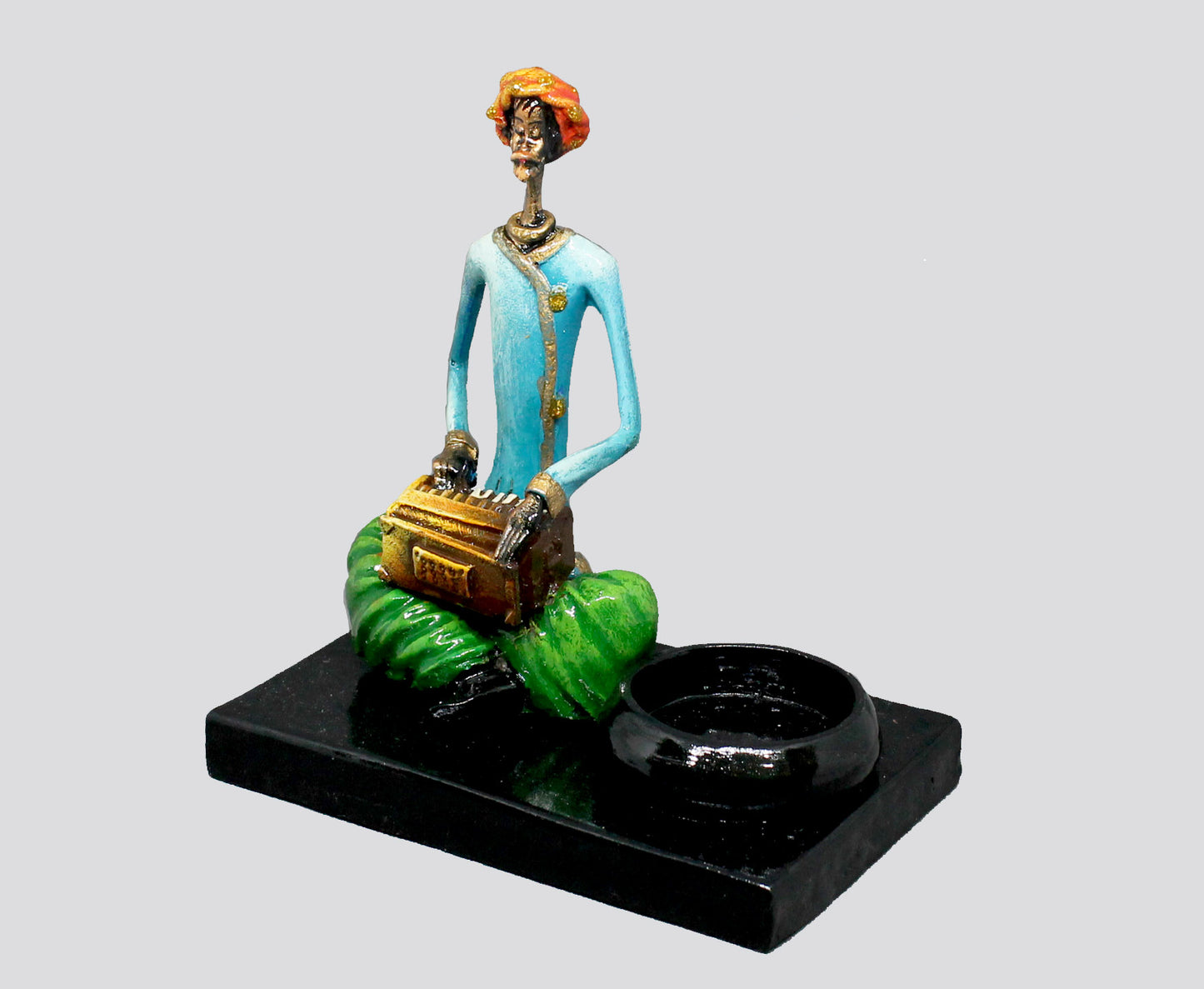 CANDLE HOLDER MALE MUSICIAN PLAYING HARMONIUM - NATURAL COLOUR SINGLE PIECE